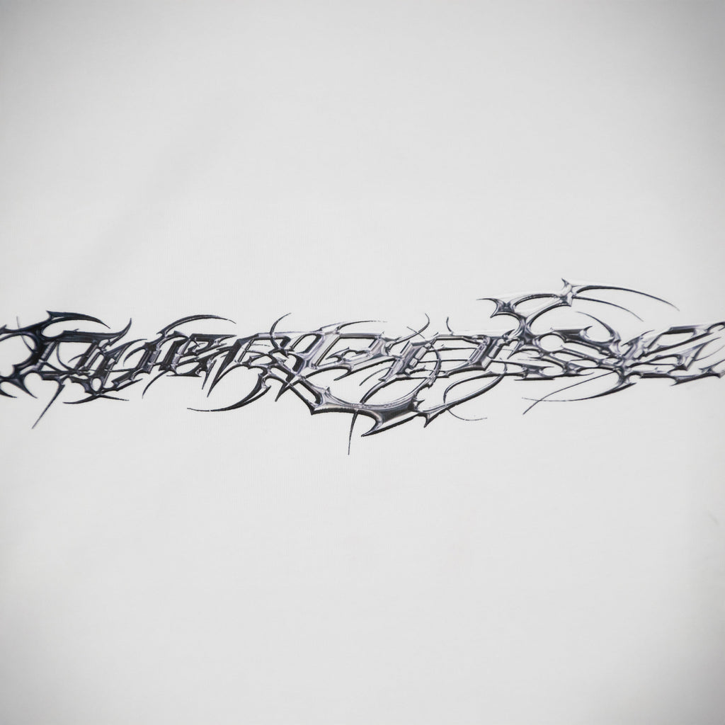 "TRIBAMETAL" LOGO TRNSFRMR L/S - ANGEL